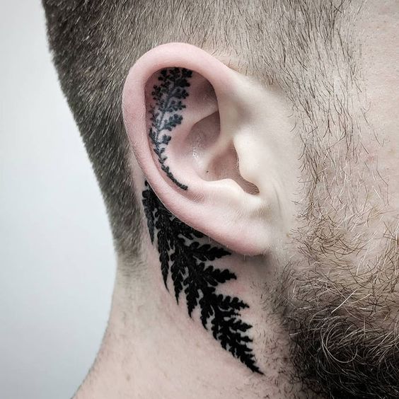 Spectacular men's tattoos behind the ear 16 ideas for a stylish statement