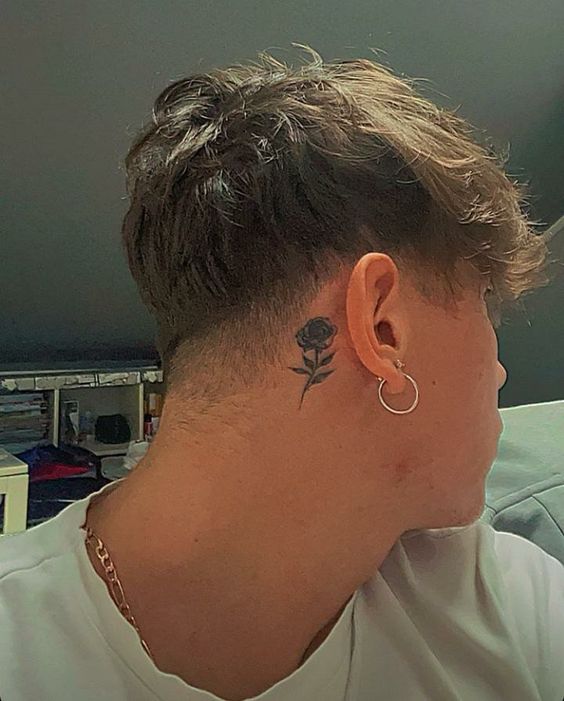 Spectacular men's tattoos behind the ear 16 ideas for a stylish statement