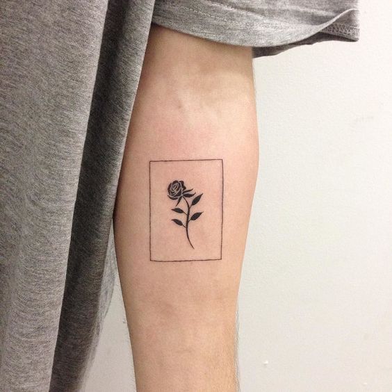 Minimalist tattoos 2024: Bold designs for men 15 ideas