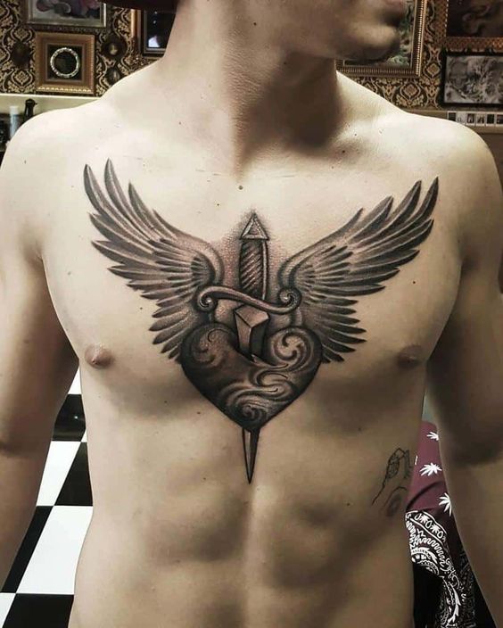 Wings Tattoos 2024: Men's Symbolic Drawings 15 Ideas