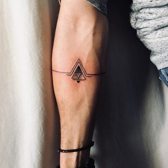 Minimalist tattoos 2024: Bold designs for men 15 ideas