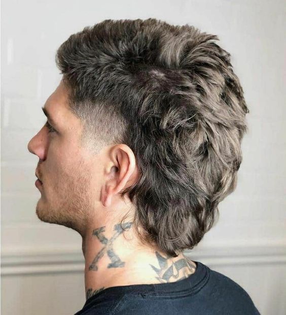 Embrace Revolution's bold wavy wolf haircut 15 ideas