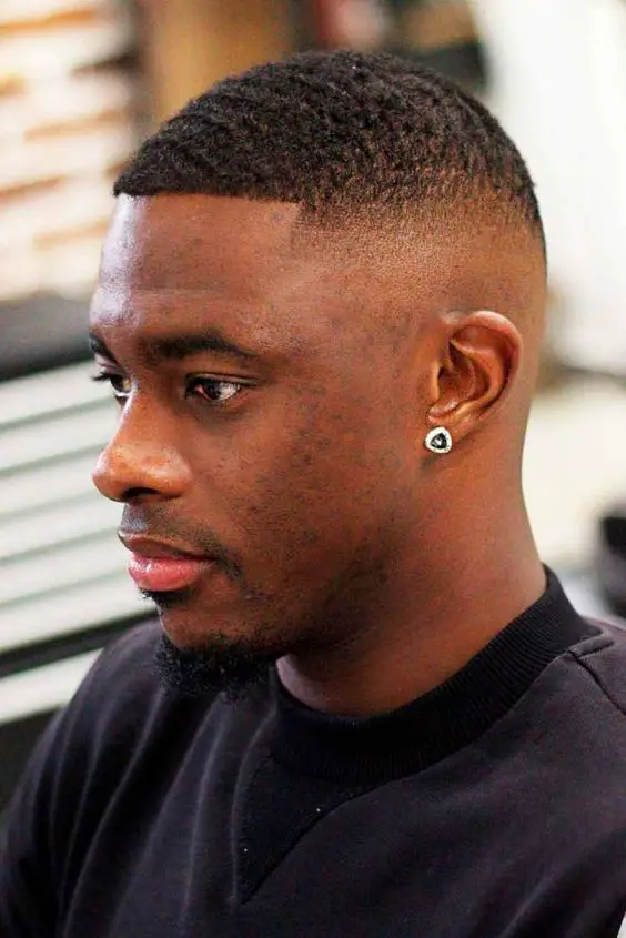 Mastering the buzz cut: bold 2024 styles for dark-skinned men 16 ideas