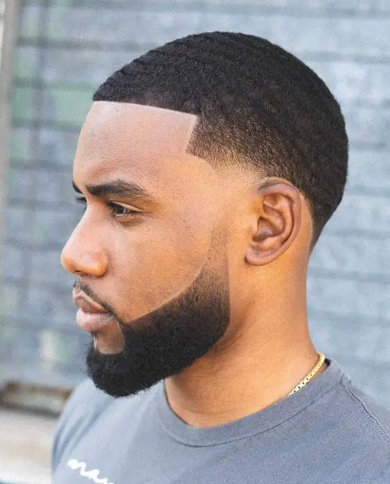 Mastering the buzz cut: bold 2024 styles for dark-skinned men 16 ideas