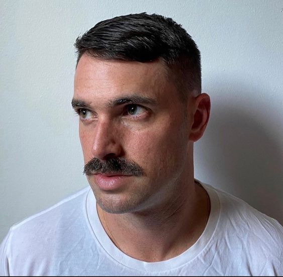 Explore 21 Ideas Iconic 70s Men's Mustaches: Bold Styles and Timeless Trends