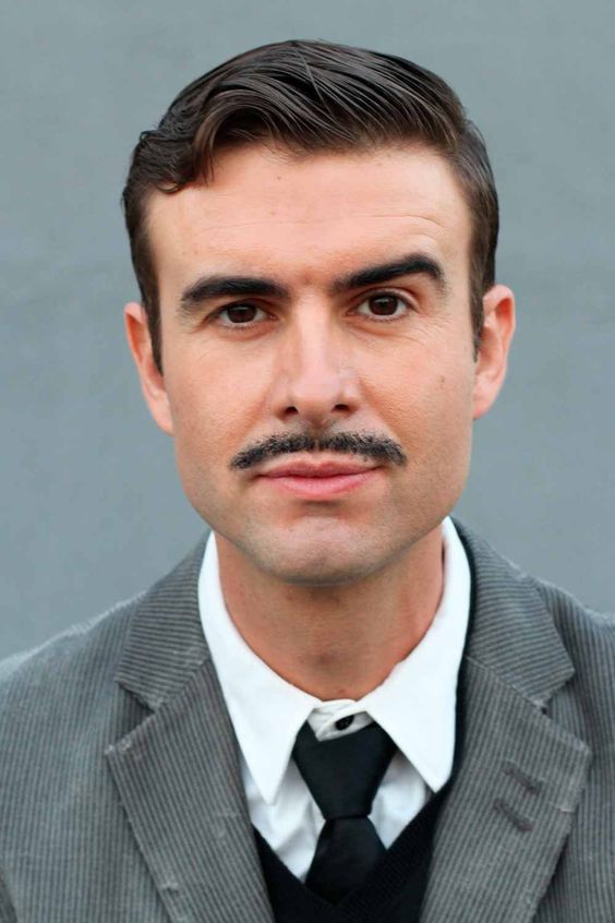 Explore 21 Ideas Iconic 70s Men's Mustaches: Bold Styles and Timeless Trends