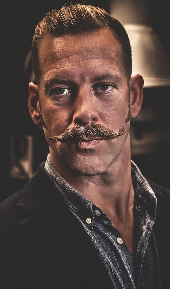 Explore 21 Ideas Iconic 70s Men's Mustaches: Bold Styles and Timeless Trends