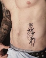 Rose Tattoo Designs 2024 Bold Stylish Ink For Men   9 22 150x188 